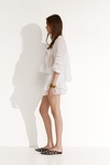 White Shorts With Fine Pleats And Lace-Trimmed Hems