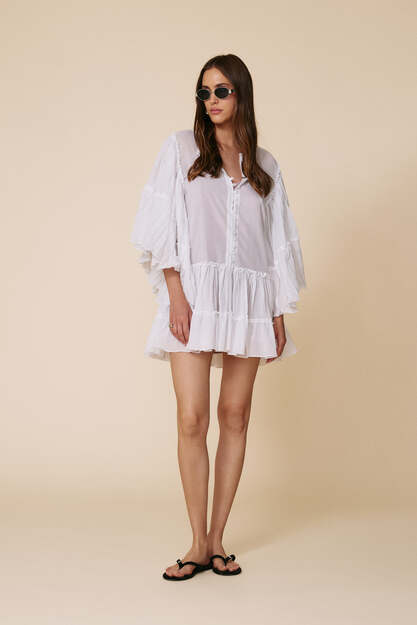 White Mini Dress With A relaxed Fit And Ruffle Details