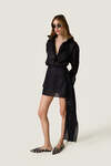 Black loose dress with an asymmetric cut and flowing side detail