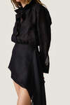 Black loose dress with an asymmetric cut and flowing side detail