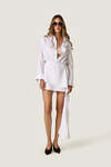 White loose dress with an asymmetric cut and flowing side detail