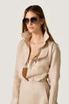 Beige loose dress with an asymmetric cut and flowing side detail
